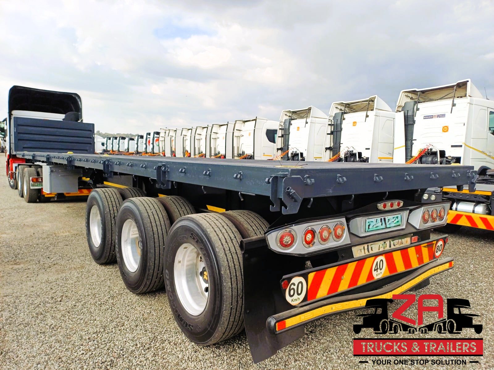 2023 HENRED FRUEHAUF TRI-AXLE FLAT DECK TRAILER #53012